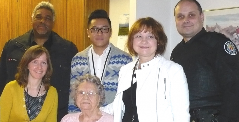 Constable Gary Gomez, Community Relations Officer; Hinson Ho, Registered Dietitian; Constable Dale Nichiporik, Community Relations Officer; Diane Duncan, Executive Director; Meals On Wheels Client; Amanda Falotico, Director of Care Services;